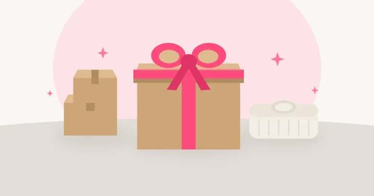 Flat illustration of a kraft gift box tied with a pink ribbon beside smaller shipping boxes and a folded sweater on a neutral tabletop.
